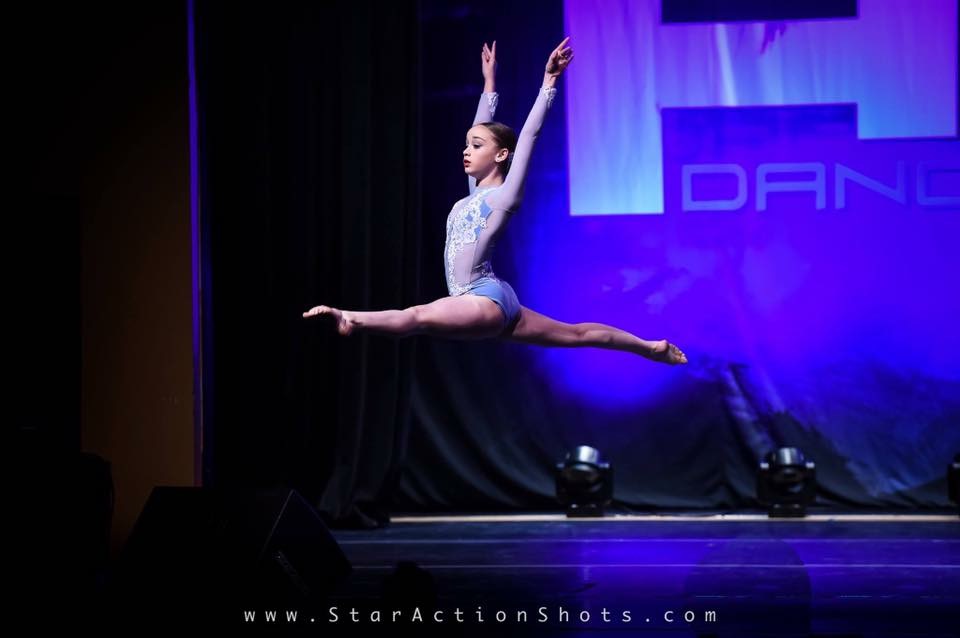 dancer leaping on stage